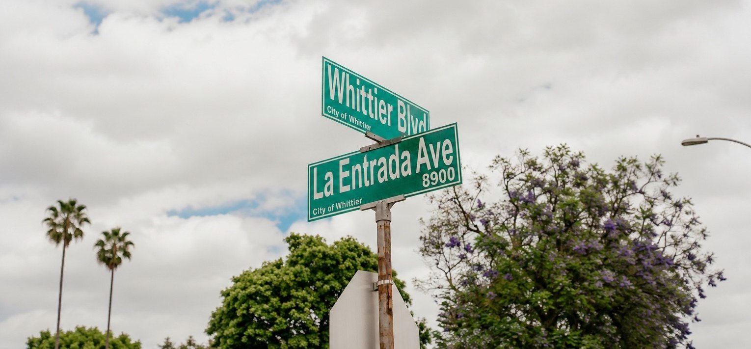 Whittier street signs near Sessions Cycle